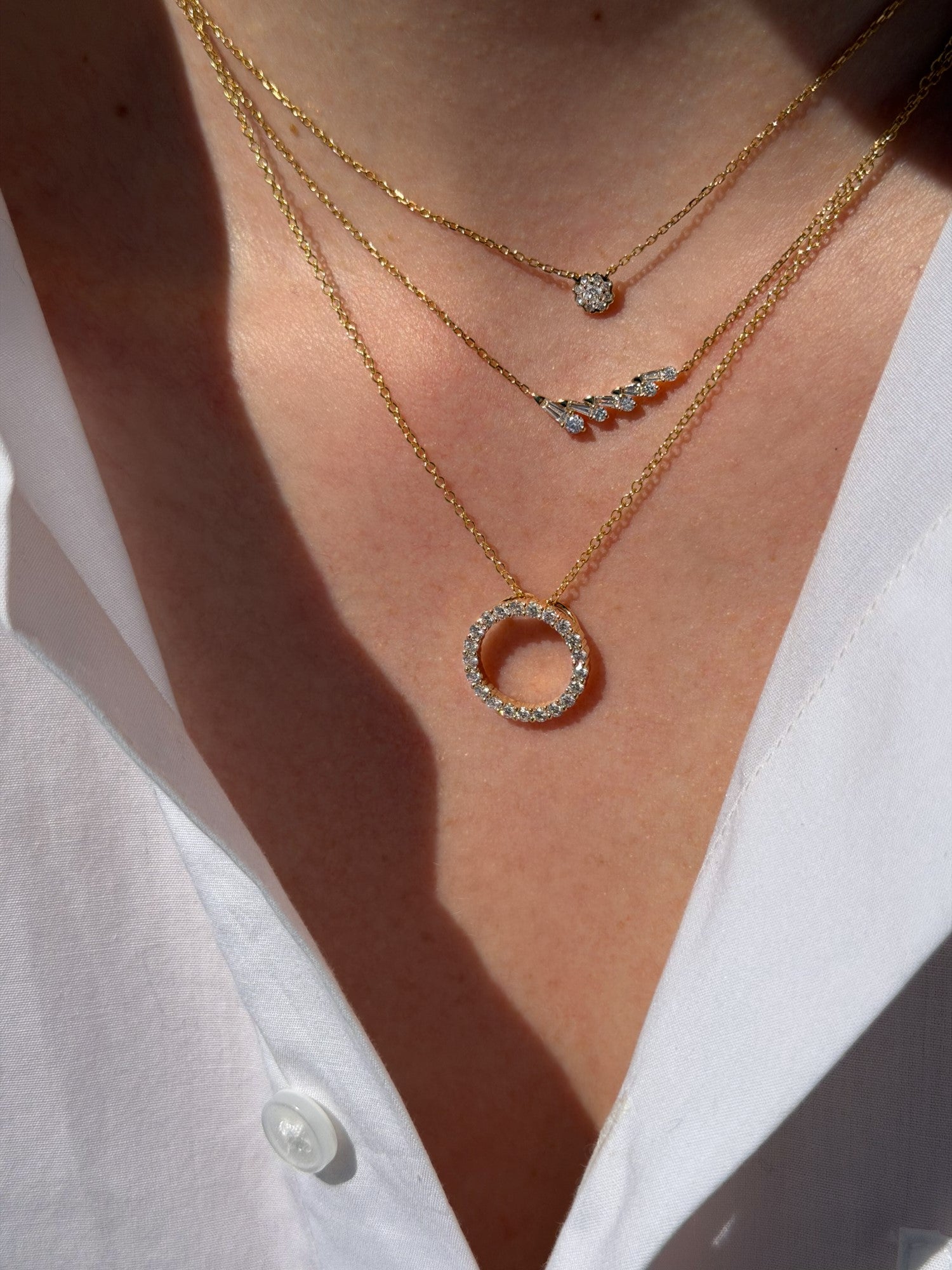 Cirkelvedhæng i 18 kt. rosaguld med 1,60 ct. champagne diamanter