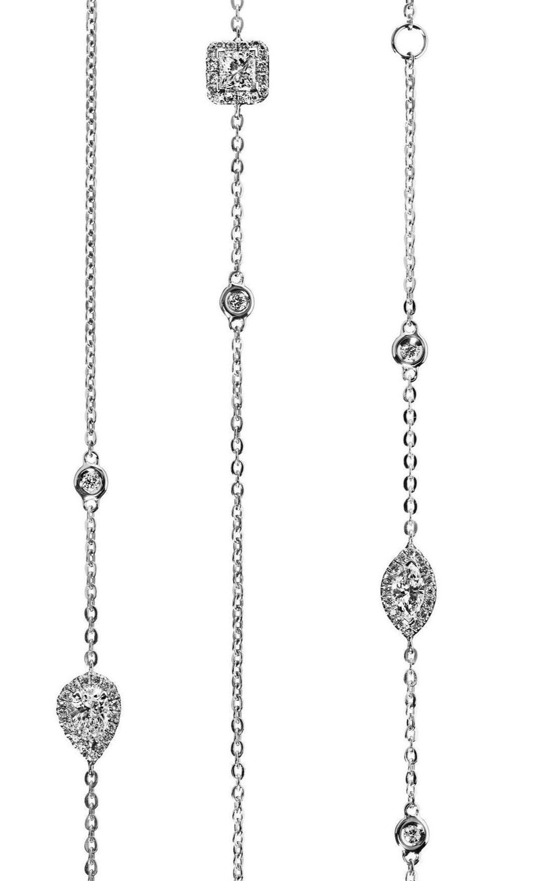 Armbånd længst til venstre:  Armbånd i 18 kt. hvidguld prydet med en 0,18 ct. dråbesleben Top Wesselton/VVS diamant omkranset af 19 Top Wesselton/VVS-VS brillanter, i alt 0,08 ct.                                                                                                           