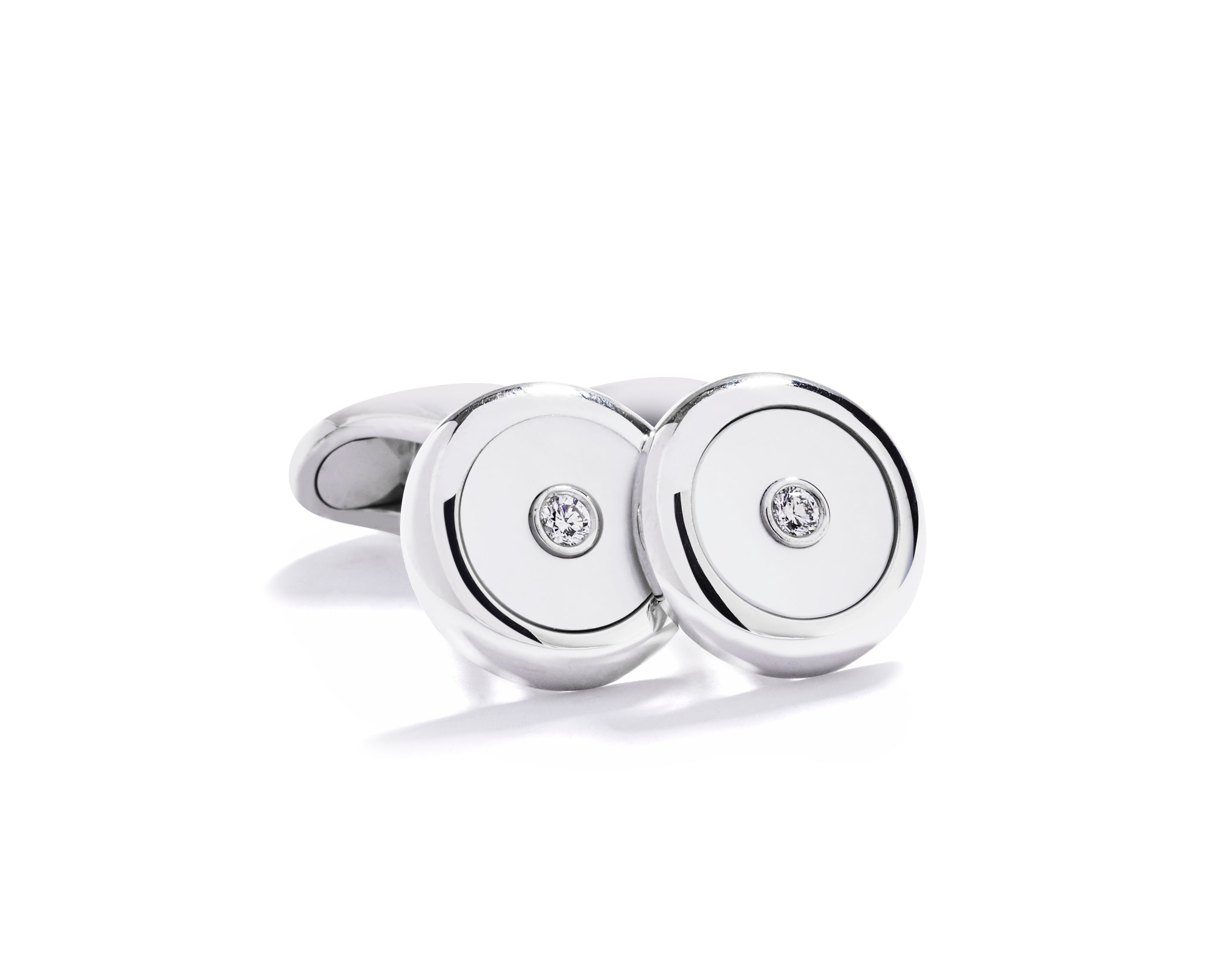 Manchetknapper i 18 kt. hvidguld og perlemor med 2 brillanter