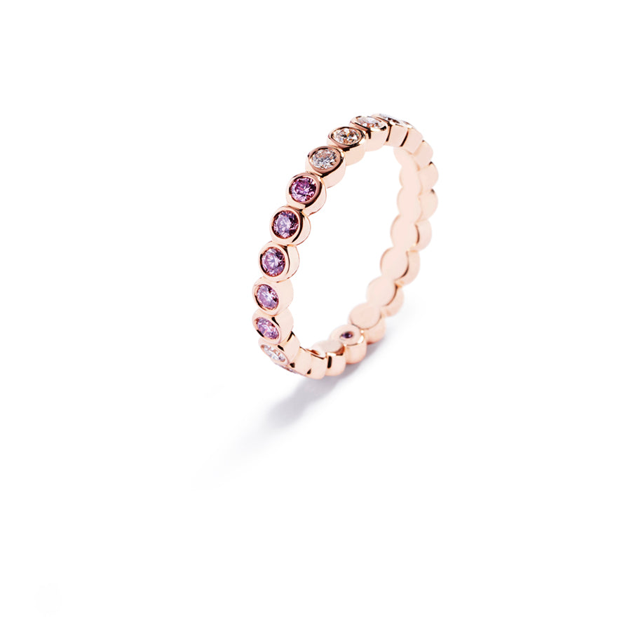 Alliancering med 0,65 ct. brillanter og Argyle Pink diamanter