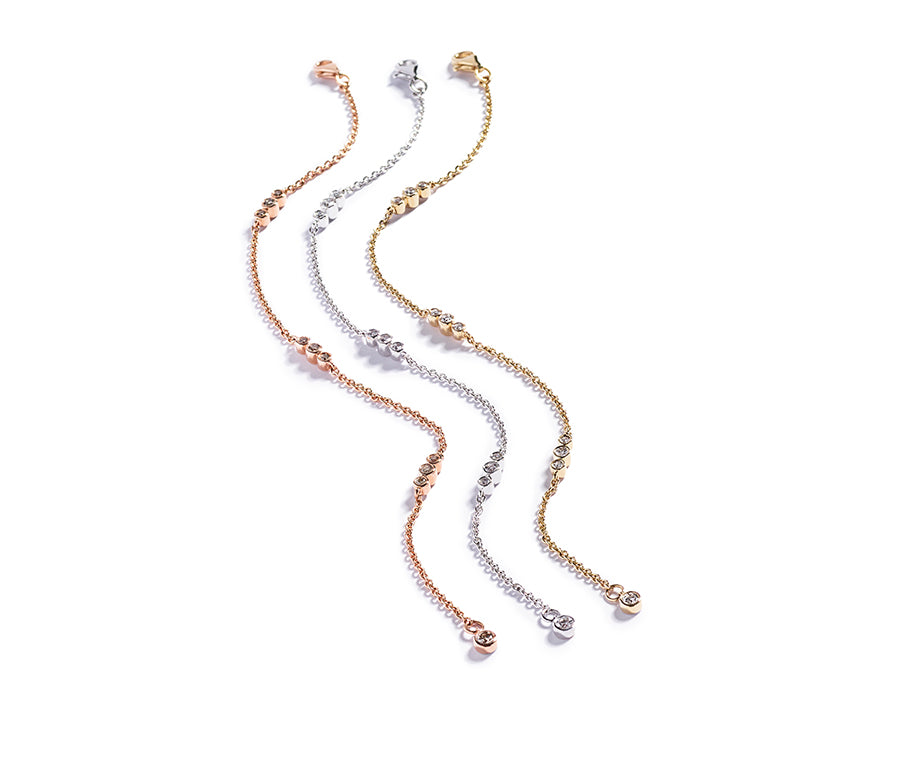 Signatur armbånd fra Hartmann's i 18 kt. gulguld med 19 brillanter